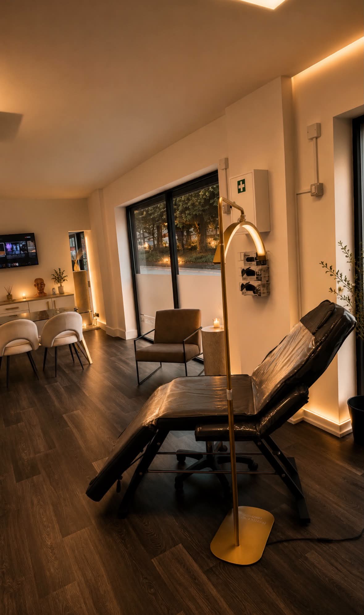 The clinic's treatment chair and waiting area, with a window onto Oxford Street